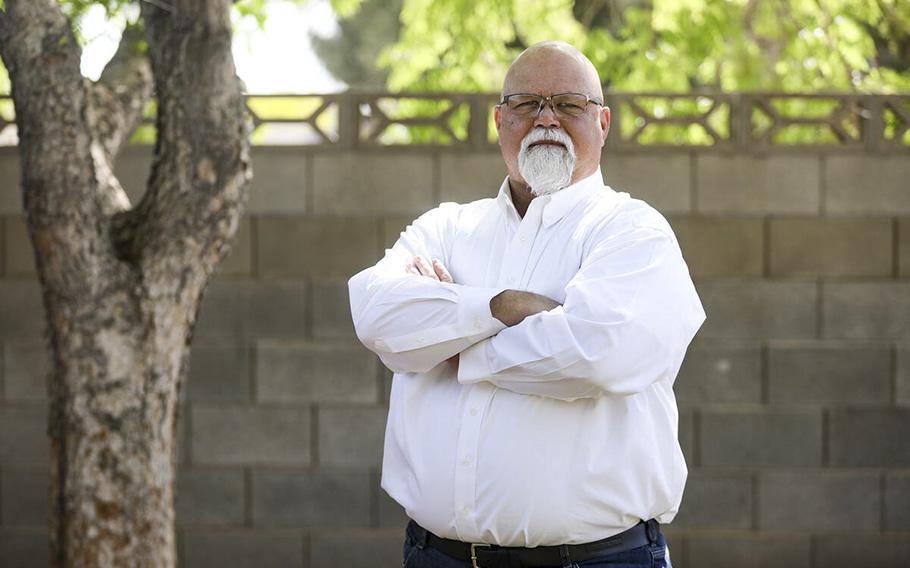 Dave Crete, an Air Force veteran, stands outside his home in Las Vegas, on Thursday, April 27, 2023. Crete is working with U.S. Rep. Mark Amodei, R-Nev., to introduce legislation that will compensate veterans who worked at the Nevada test site after he and hundreds of others have reported health issues they attribute to working at the base. 