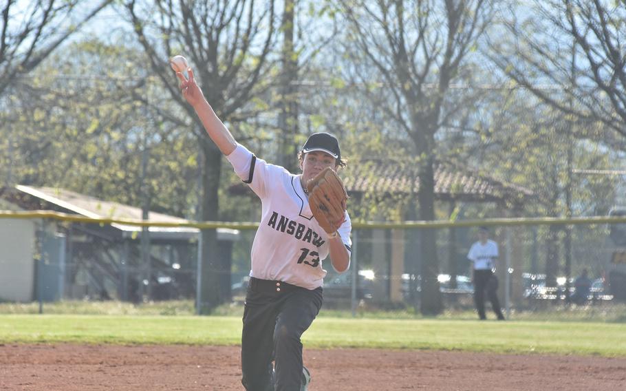 Ansbach’s Jayden Murray sends a pitch toward home in the Tigers’ game against the Aviano Saints on Saturday April 28, 2023.