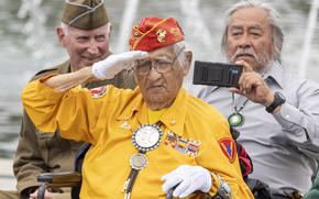 Navajo Code Talker Thomas Begay salutes the audience on Thursday, May 8, 2025 in Washington. Begay, born in 1927 near Two Wells, NM, served in the 5th Signal Company, 5th Marine Division; 27th Marine Regiment, 5th Marine Division from September 1943 - July 1946 at Iwo Jima. Friends of the National World War II Memorial and the National Park Service  commemorated the 80th anniversary of the Allied forces victory in the Atlantic and the end of World War II in Europe with a special V-E Day event hosted at the National World War II Memorial  (Eric Kayne/Stars and Stripes)