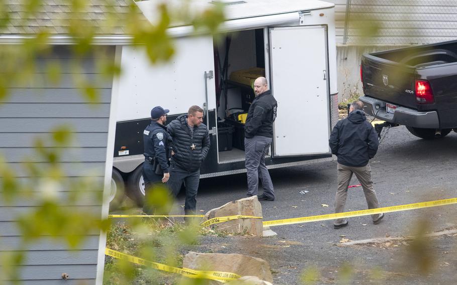 Officers investigate a homicide at an apartment complex south of the University of Idaho campus on Sunday, Nov. 13, 2022. Four people were found dead on King Road near the campus, according to a city of Moscow news release issued Sunday afternoon.