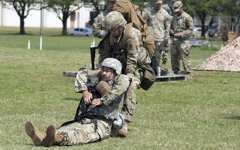 U.S. Army Japan's first-ever Expert Soldier Badge competition began Monday, April 18, 2022, with a field of 121 from across Japan and Guam. By Thursday, just 25 competitors remained.
