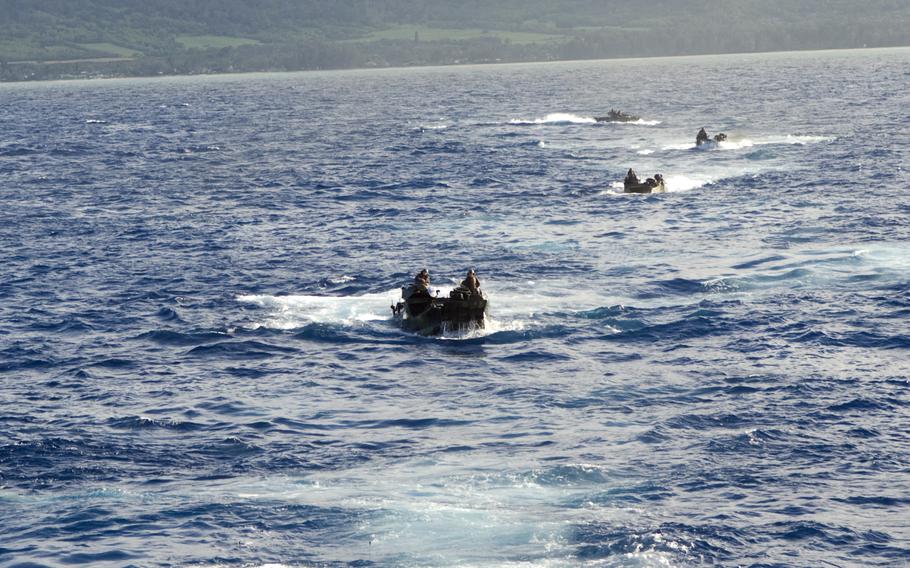 Marine Corps amphibious assault vehicles transit the Pacific Ocean during Rim of the Pacific 2008. RIMPAC is the world's largest multi-national exercise.