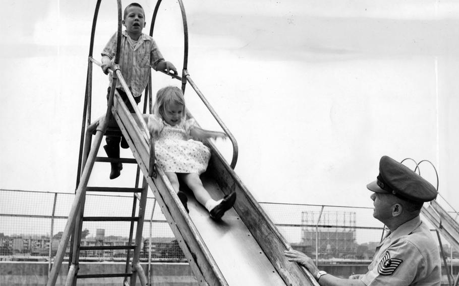 Children blow off steam at Green Park Housing Allex's rooftop playground in May 1962. Green Park, in western Tokyo, housed more than 2,000 people at a time between 1954 and 1973. 