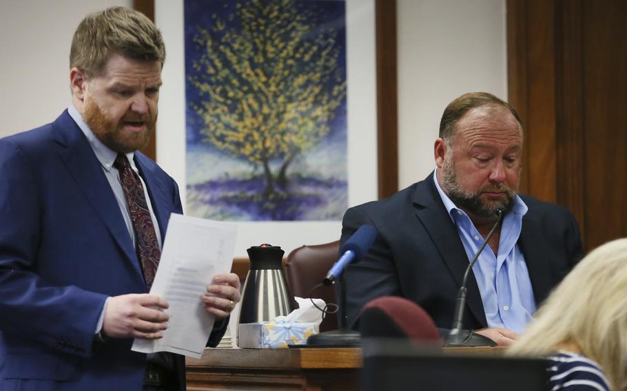 Mark Bankston, lawyer for Neil Heslin and Scarlett Lewis, asks Alex Jones questions about text messages during trial at the Travis County Courthouse in Austin, Wednesday Aug. 3, 2022.