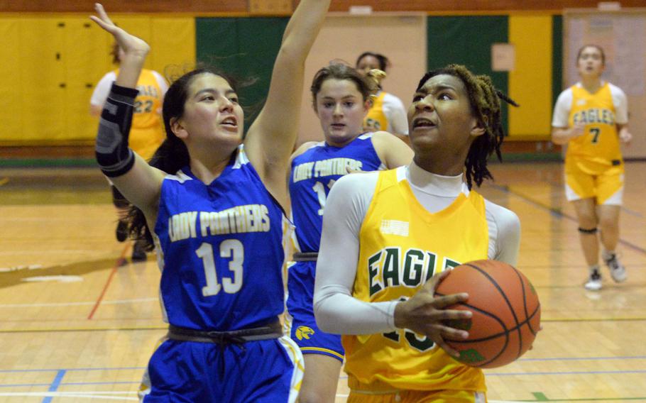 Keiya Carlson, left, and Yokota’s home game against Christian Academy Japan on Friday was postponed; Jaylie Johnson and Robert D. Edgren’s home game against a Japanese team Saturday was canceled.