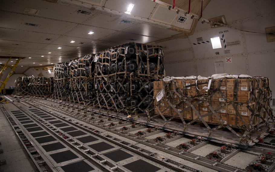 Pallets of ammunition, weapons and other equipment bound for Ukraine are loaded on a plane by the 436th Aerial Port Squadron during a foreign military sales mission at Dover Air Force Base, Delaware,  Jan. 24, 2022. Since 2014, the United States has committed more than $5.4 billion in total assistance to Ukraine, including security and non-security assistance.