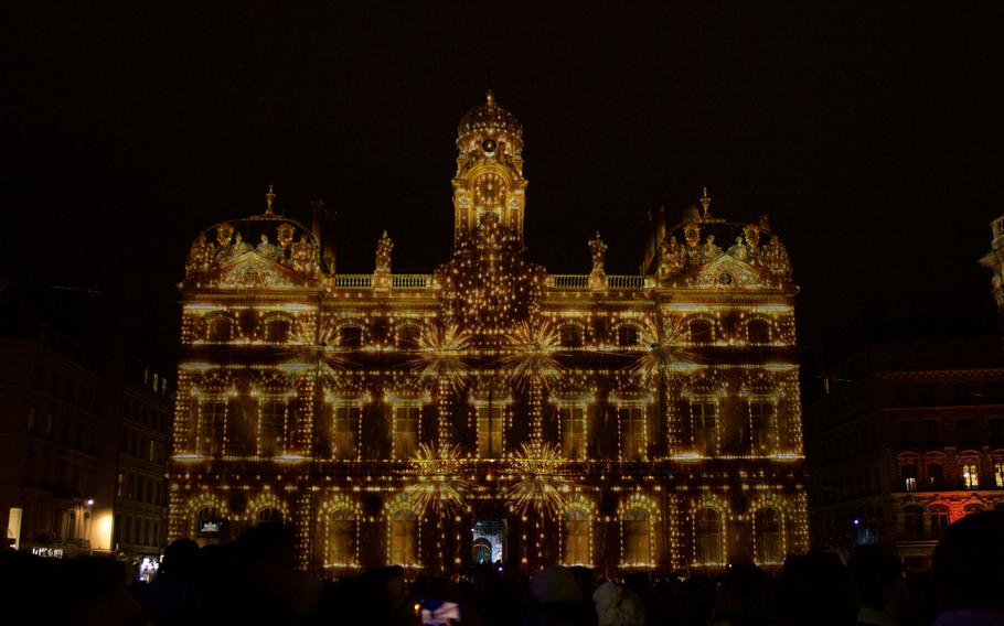 Lyon City Hall and other buildings in the French city’s Old Town are illuminated during Fête des Lumières, or the Festival of Lights, which takes place Dec. 8-11 this year.