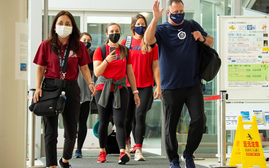 Members of the U.S. women’s Olympic softball team arrive at Marine Corps Air Station Iwakuni, Japan, Monday, July 5, 2021.