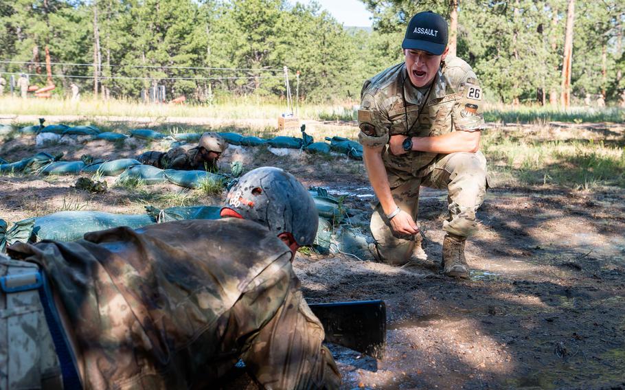 An instructor yells at a cadet