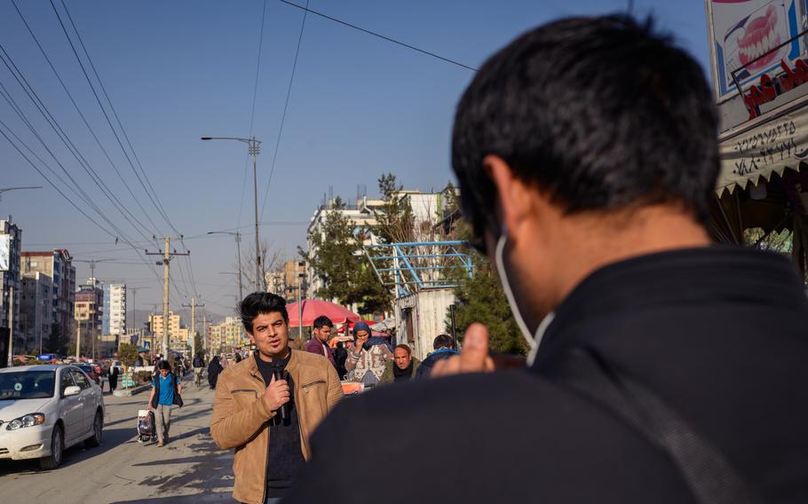 Online video producer Sher Khab Azrati, 27, records an episode for “Kabul Lovers” in which he asked people in the Afghan capital about the economy and winter. 