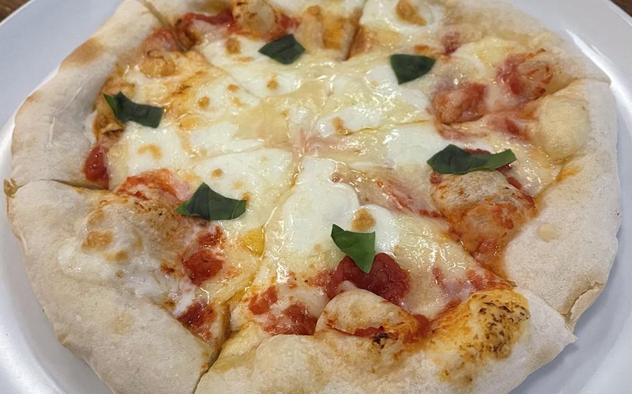Kujira's margherita pizza tasted truly homemade and arrived piping hot.