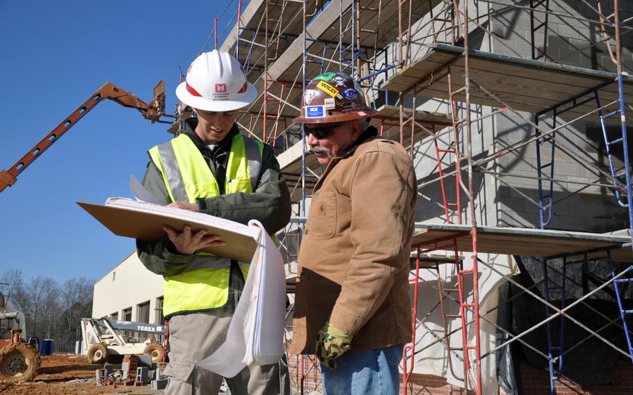 The U.S. Army Corps of Engineers constructs a barracks building at Fort Bragg, N.C., in 2009.