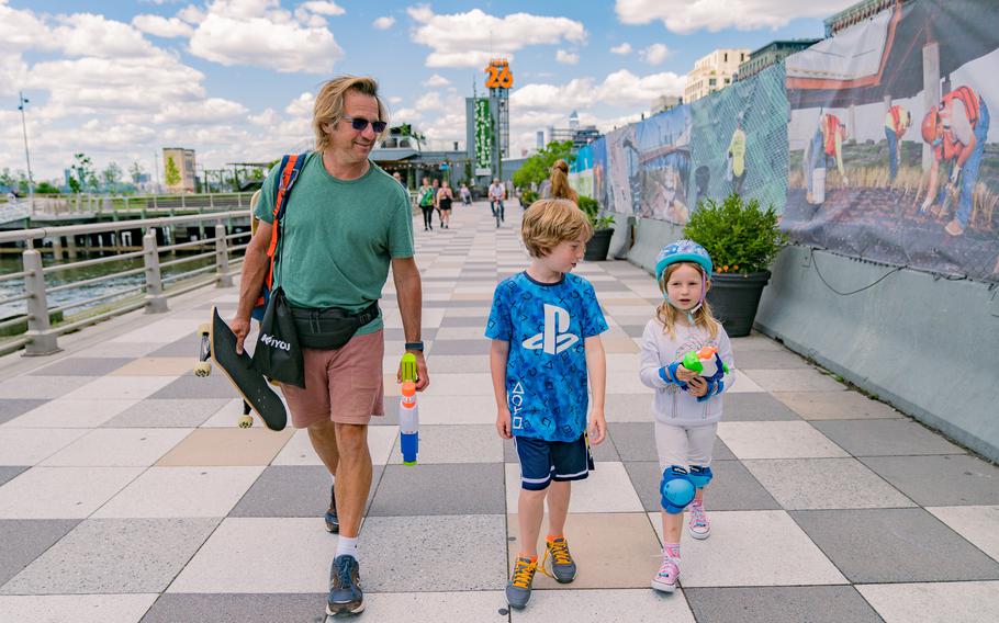 David Bressler and his kids Reed Romann and Evie Romann take a break from screens and head outside at Pier 26 in Manhattan.