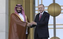 Turkish President Recep Tayyip Erdogan, right, and Saudi Crown Prince Mohammed bin Salman shake hands during a welcome ceremony, in Ankara, Turkey, Wednesday, June 22, 2022. Saudi Crown Prince arrived in Ankara on Wednesday, making his first visit to Turkey following the slaying of Saudi columnist Jamal Khashoggi in Istanbul. Saudi Arabia and Turkey press ahead with efforts to repair ties that were strained by Khashoggi's killing.