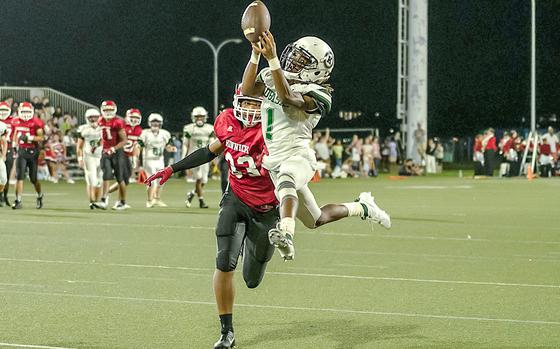 Kubasaki's Carlos Cadet caught one of two touchdown passes thrown by Trajon Weaver.