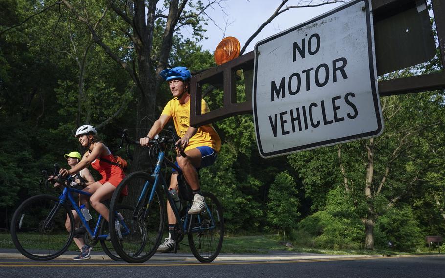 People enjoy a stretch of Beach Drive, which was closed to weekday car traffic, in Washington D.C.