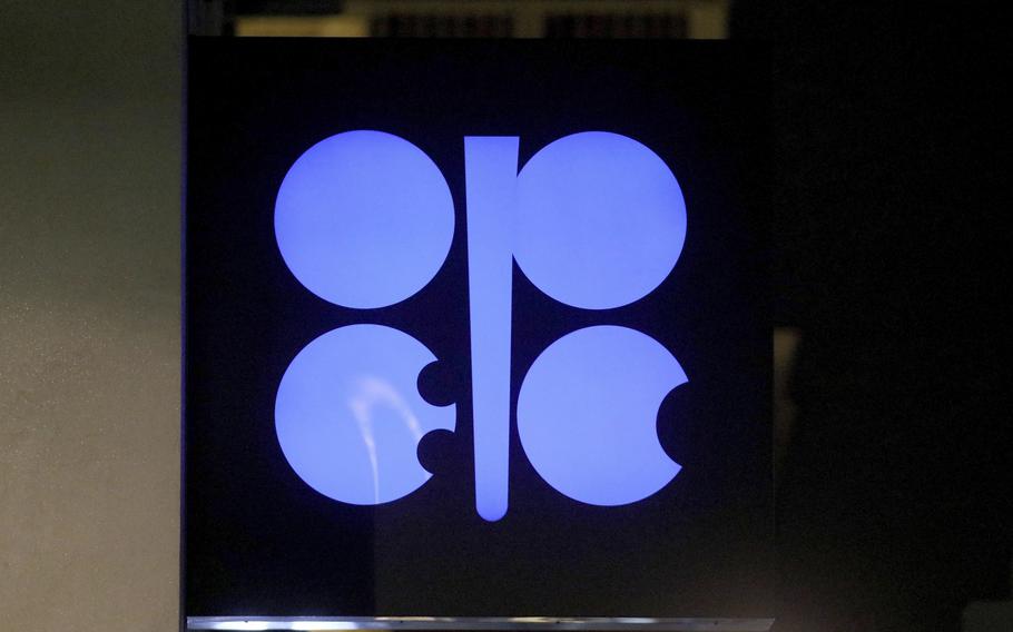 FILE - In this Dec. 19, 2019 file photo, the advertising label of the Organization of the Petroleum Exporting Countries, OPEC, shines at their headquarters in Vienna, Austria. The OPEC oil cartel and allied countries are meeting to decide on production. The meeting is being closely watched because oil markets are tight and the price of crude is just off a three-year high as the global economy bounces back from the pandemic. 