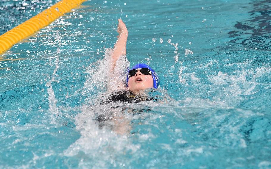 NATO Marlin Sophie Mercier swims the backstroke in the 13-year-old girls 200-meter individual medley during the European Forces Swim League Short-Distance Championships on Feb. 11, 2024, at the Pieter van den Hoogenband Zwemstadion at the Nationaal Zwemcentrum de Tongelreep in Eindhoven, Netherlands.