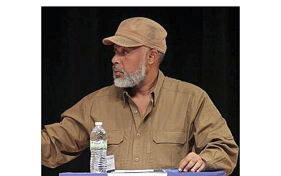 Eric Jean-Baptiste participates in an Oct. 4, 2015, debate in Miami, Florida.