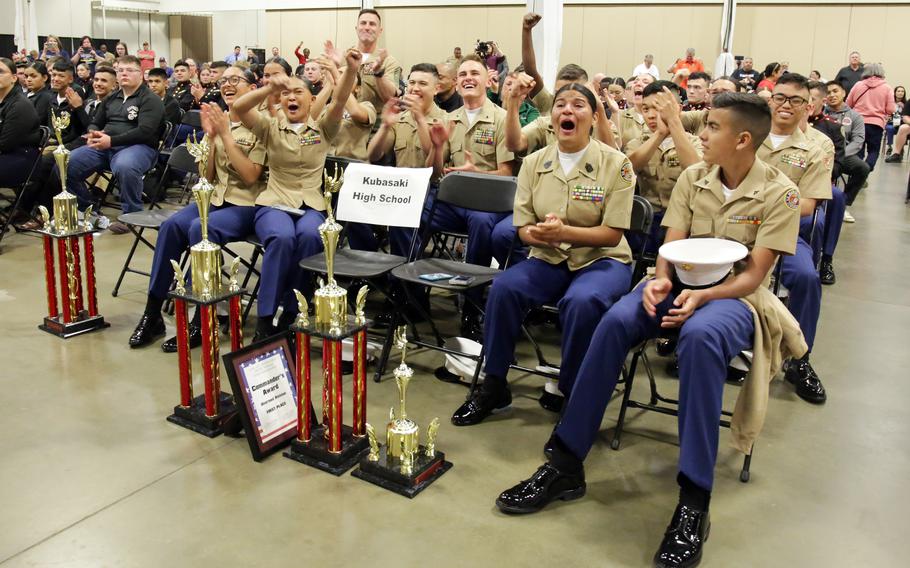 The Dragon Battalion of Kubasaki High School at Camp Foster, Okinawa, celebrate their national JROTC title in Fredericksburg, Va., April 12, 2023.