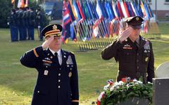 Col. Douglas LeVien, deputy commander of the 21st Theater Sustainment Command, left, and Command Sgt. Maj. Sean Howard salute after placing a wreath at the 21st TSC memorial, Nov. 10, 2021, during the unit’s Veterans Day observance at Panzer Kaserne in Kaiserslautern, Germany.














