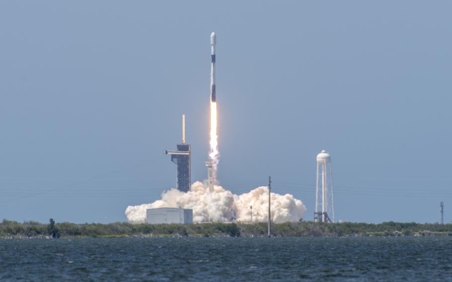 A SpaceX Falcon 9 rocket launches from Space Launch Complex 39A MAY 4, 2021, at Cape Canaveral Space Force Station, Florida. The rocket transported 60 Starlink satellites into space. The satellites are designed to enhance international broadband capabilities. 