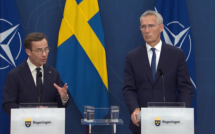 NATO Secretary-General Jens Stoltenberg, right, listens as Swedish Prime Minister Ulf Kristersson answers a question Oct. 24, 2023, at a news conference in Stockholm, Sweden.