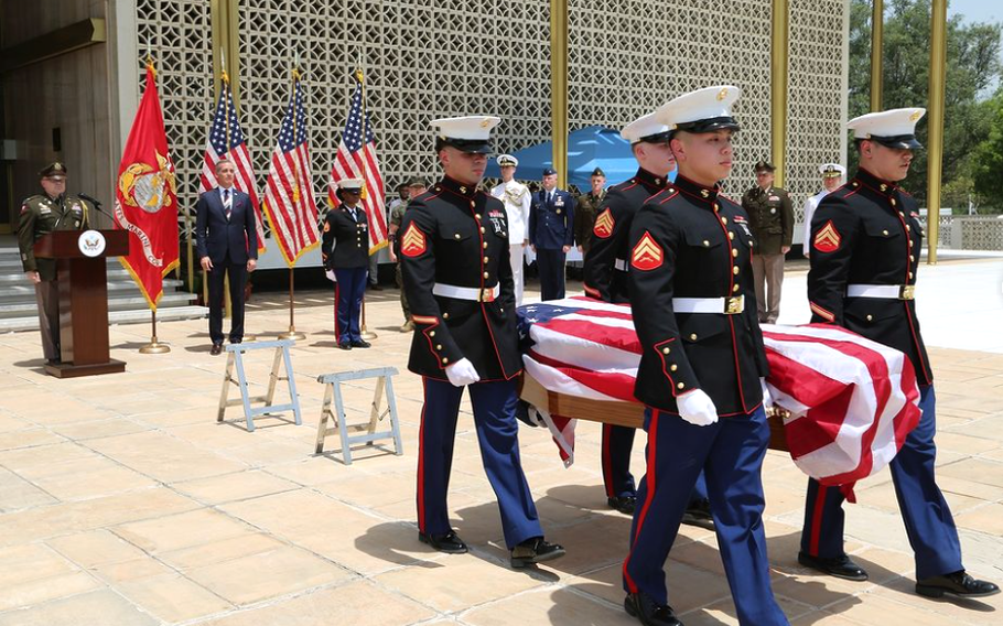 A Marine security detachment provides an honor guard during a sendoff ceremony for the remains of Marine Corps Maj. Gen. Harry K. Pickett at the U.S. Embassy in New Delhi, India, on Tuesday, May 23, 2023.