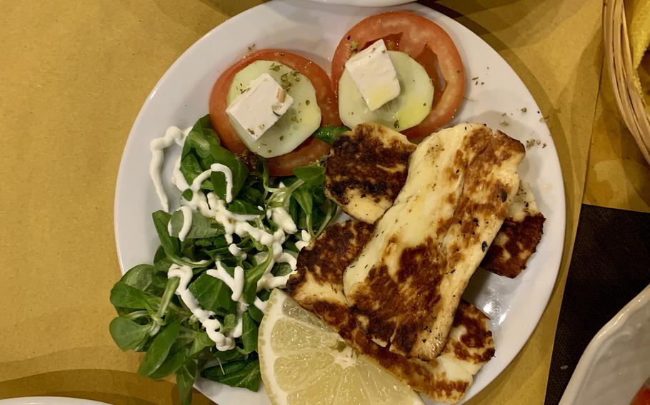 Appetizers served on a recent visit to Magn' A Grecia in Naples, Italy, included grilled halloumi cheese with cucumbers, tomatoes and feta cheese. 