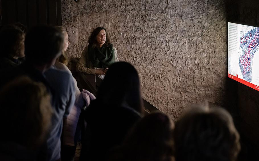 Tour guide Andrea Stephany takes English-speaking visitors through underground tunnels in central Kaiserslautern and explains the city’s history on Saturday, Nov. 5, 2022.