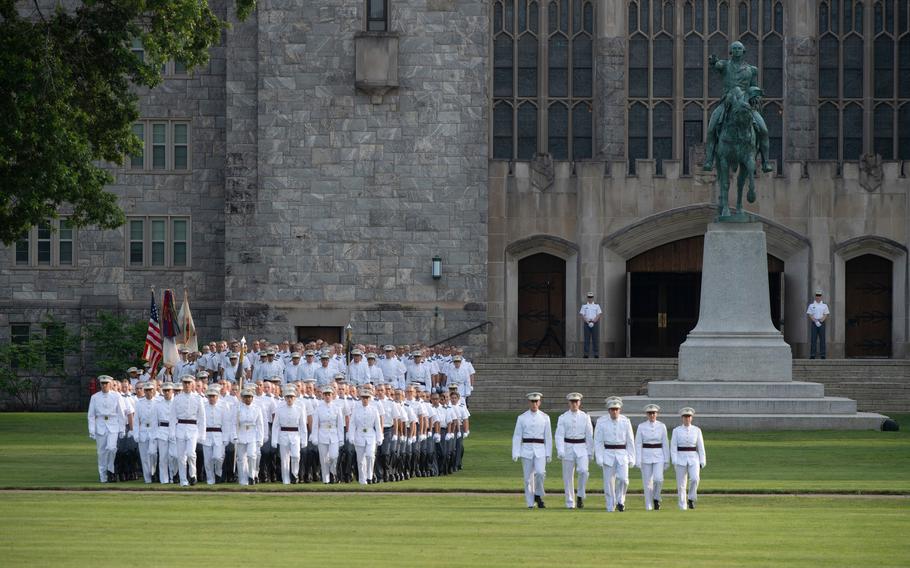 Cadets in formation on the lawn.