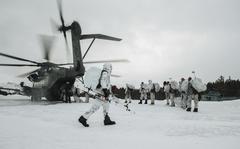 U.S. Marines with the 3rd Battalion, 6th Marine Regiment, 2nd Marine Division, load onto a CH-53E Super Stallion during training March 3, 2022, in preparation for Exercise Cold Response in Setermoen, Norway.