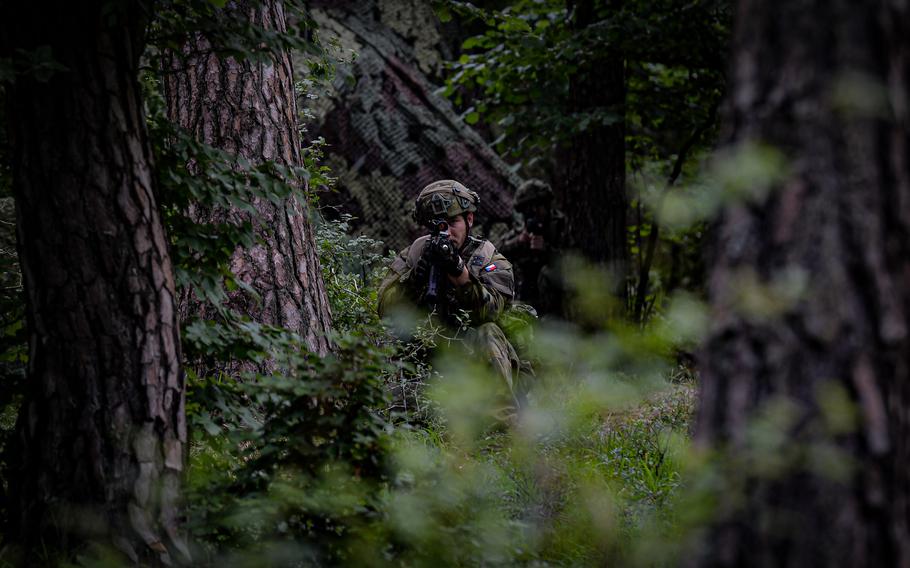 Czech soldiers guard a foward-positioned command post during exercise Combined Resolve at the Joint Multinational Readiness Center in Hohenfels, Germany, June 8, 2022. More than 5,000 U.S. service members, allies and partners from more than 10 countries, participated in integrated combat operations.
