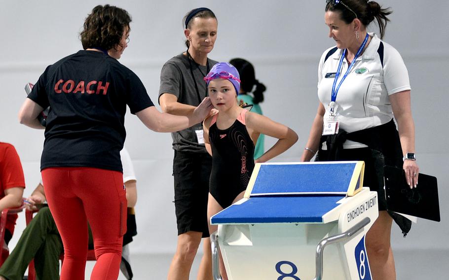 Aviano's Gwendolyn Douglass prepares for the girls 8 and under 200-meter freestyle race on Saturday during the European Forces Swin League Short Distance Championships at the Pieter van den Hoogenband Zwemstadion at the Zwemcentrum de Tongelreep.