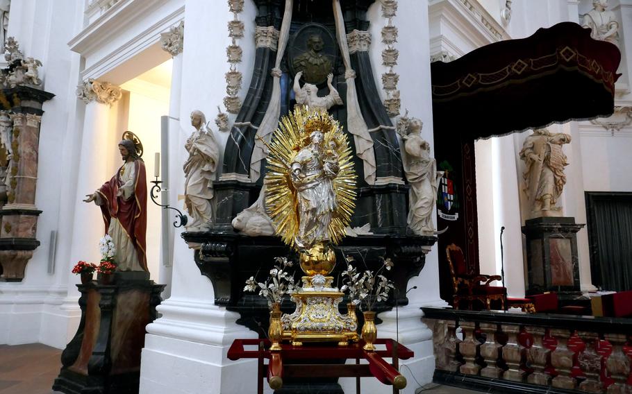 The opulent interior of the Baroque basilica in Fulda, Germany. The church was built in the early 18th century and is dedicated to St. Boniface.