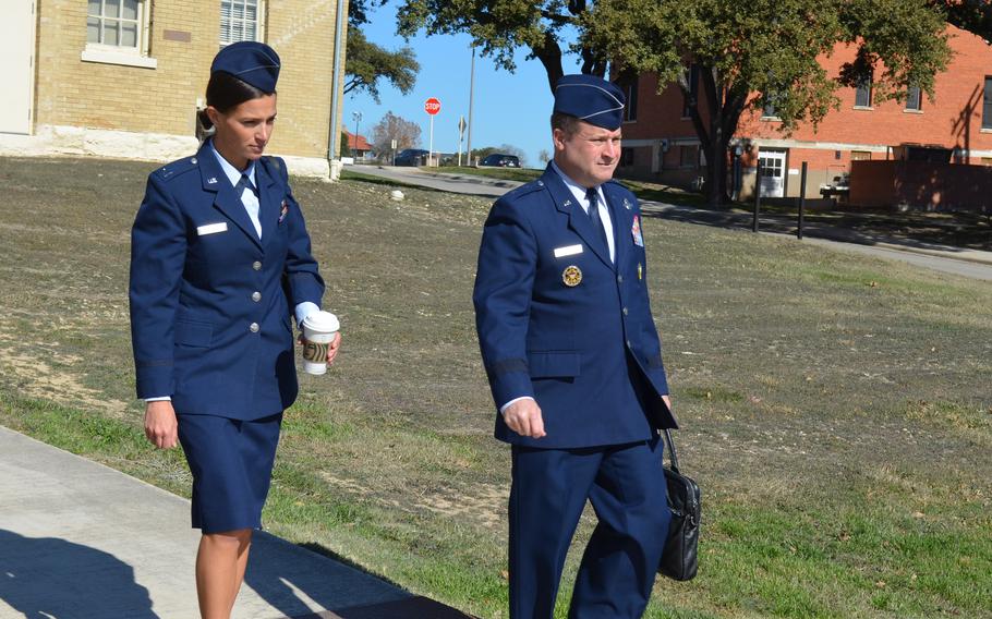 Air Force Maj. Gen. Phillip Stewart, right, and his defense attorney Capt. Jordan Grande exit a courthouse following Stewart’s arraignment Jan. 18, 2024, at Joint Base San Antonio-Fort Sam Houston, Texas. Stewart is charged with sexual assault, dereliction of duty, behavior unbecoming of an officer and adultery.