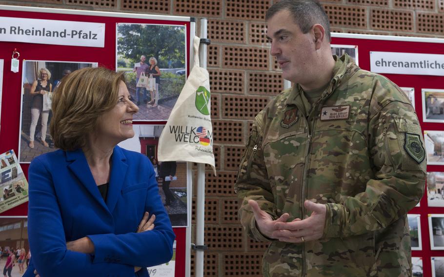 Rheinland-Pfalz governor Malu Dreyer speaks with U.S. Air Force Brig. Gen. Mark R. August, the former 86th Airlift Wing commander, in Kottweiler-Schwanden, Germany, in 2020. On Nov. 2, 2021, Dreyer announced a loosening of coronavirus restrictions for outdoor events in Rheinland-Pfalz.