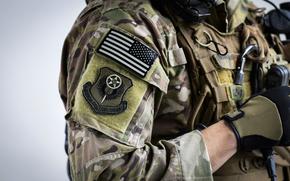 A member of the 353rd Special Operations Group, Detachment 1, performs pre-flight inspections on a CV-22 Osprey at Yokohama North Dock, Japan, April 5, 2018. 