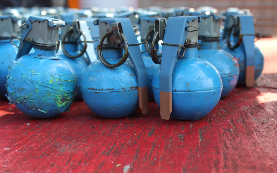 Training hand grenades are lined up at Fort A.P. Hill, Va., during range training May 6, 2023. 