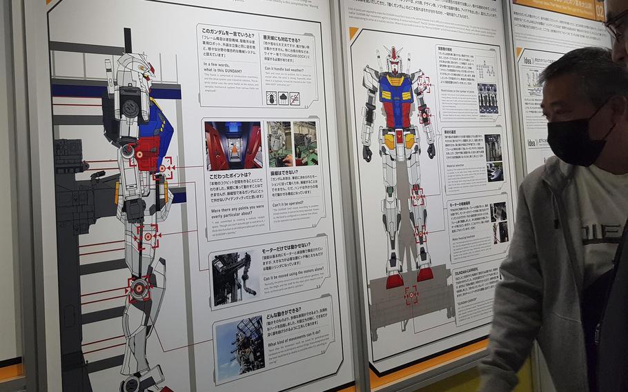Visitors to Gundam-Lab Academy, part of the Gundam Factory in Yokohama, Japan, learn about the RX-78F00, the first General Purpose Utility Non-Discontinuity Augmentation Maneuvering Weapon System, or Gundam.