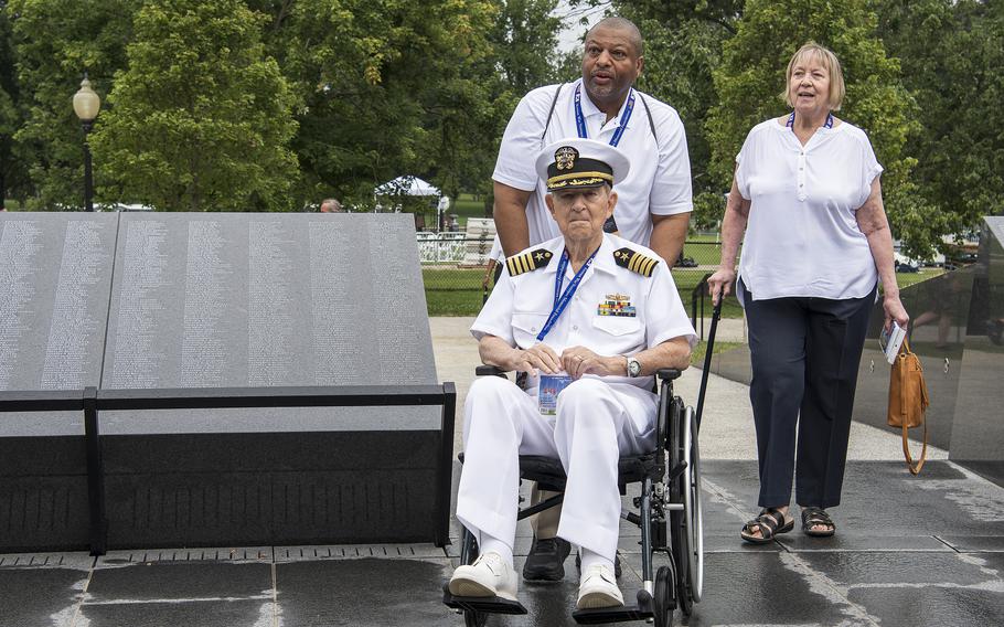 Retired Navy Capt. Richard Halferty gets wheeled in to the new Wall of Remembrance at the Korean War Memorial in Washington, D.C., on Tuesday, July 26, 2022.