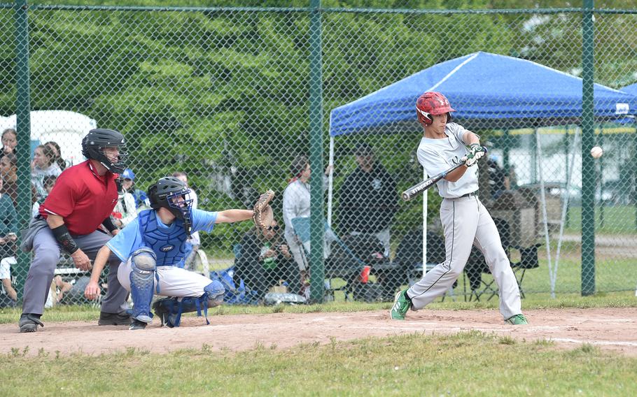 Naples junior A. J. Lopez swings at a pitch during the Division II/III DODEA European baseball championship game against Sigonella on May 20, 2023, at Southside Fitness Center on Ramstein Air Base, Germany.