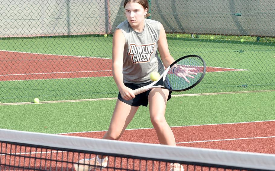 Abby Hover hits the ball at the net during an Aug. 30, 2023, practice at Kaiserslautern High School in Kaiserslautern, Germany. The Raider junior is a two-time DODEA European doubles champion and is defending her title from last year with partner Alisa Dietzel.