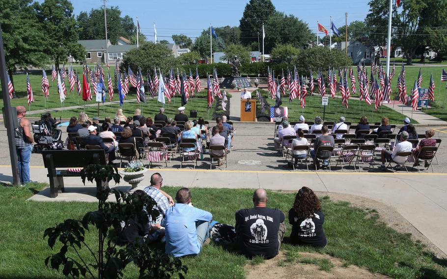 People gather for a 10th anniversary memorial service for Marines Sgt. Daniel Patron in Perry Township on Saturday, Aug. 21, 2021. Patron died Aug. 6, 2011, while defusing a roadside bomb while serving in Afghanistan.