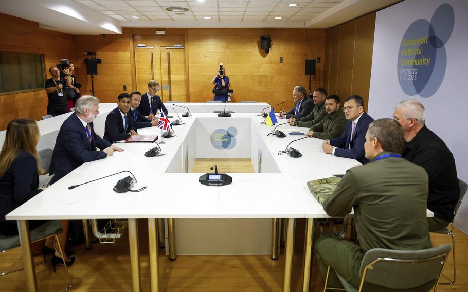 Ukraine's President Volodymyr Zelenskyy, center right, meets with British Prime Minister Rishi Sunak, center left, during the European Political Community summit in Granada, Spain, on Thursday Oct. 5, 2023. 