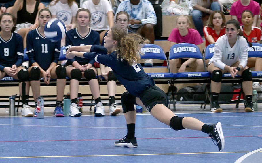 Black Forest Academy's Emma Batluck dives for a ball during a Division II semifinal match with Aviano at the DODEA European championships Friday at Ramstein High School on Ramstein Air Base, Germany.