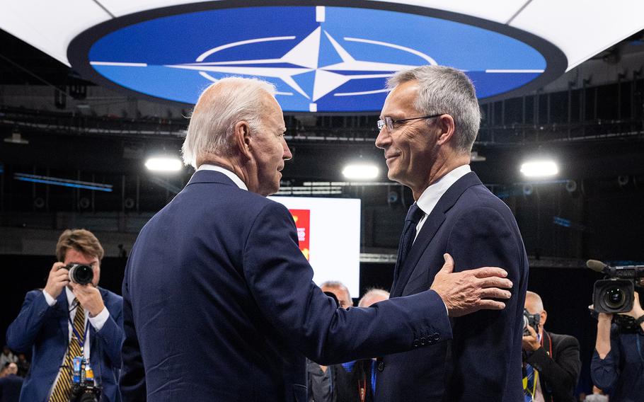 President Joe Biden talks with NATO Secretary-General Jens Stoltenberg at the NATO summit in Madrid on June 30, 2022.