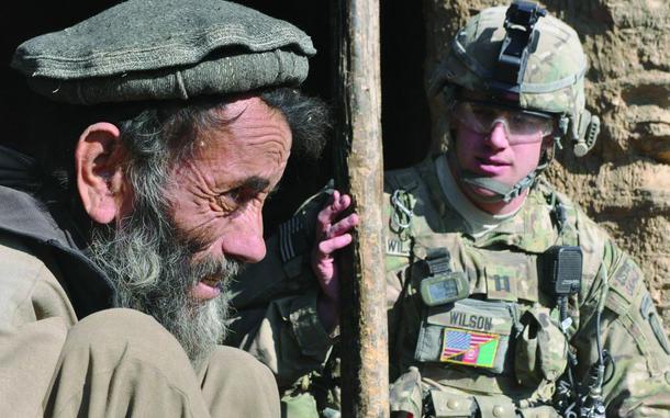 Barbar, Afghanistan, Dec. 31, 2011: Capt. Brad Wilson, a platoon leader with Company C of the 2nd Battalion, 35th Infantry Regiment, talked with a resident of Barbar, a village in eastern Afghanistan's Kunar province and a suspected Taliban enclave. The man told Wilson that no insurgents live there. Intelligence reports suggested that a midlevel Taliban operative lived in the village and insurgents stashed weapons and ammunition there as they moved to and from Pakistan, some 20 miles to the east.

Check out the article on Company C's mission here.

META TAGS: Afghanistan; Operation Enduring Freedom; War on Terror; Taliban; Reporter’s notebook; Company C; 2nd Battalion; 35th Infantry Regiment; U.S. Army; patrol