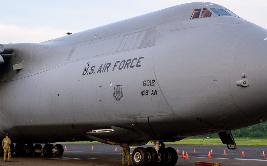 A C-5 Super Galaxy rests on a ramp.