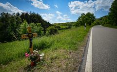 A roadside memorial along country road K22, near Ulmet, Germany, memorializes the deaths of police officers Yasmin B.  and Alexander K., as seen on May 11, 2022. The two police officers were shot and killed not far from U.S. military bases in Baumholder.